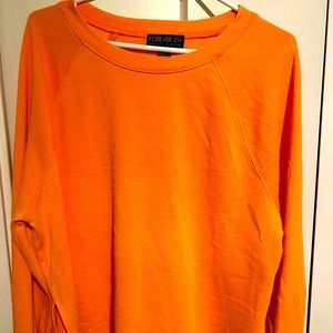 Long sleeve slitted top.